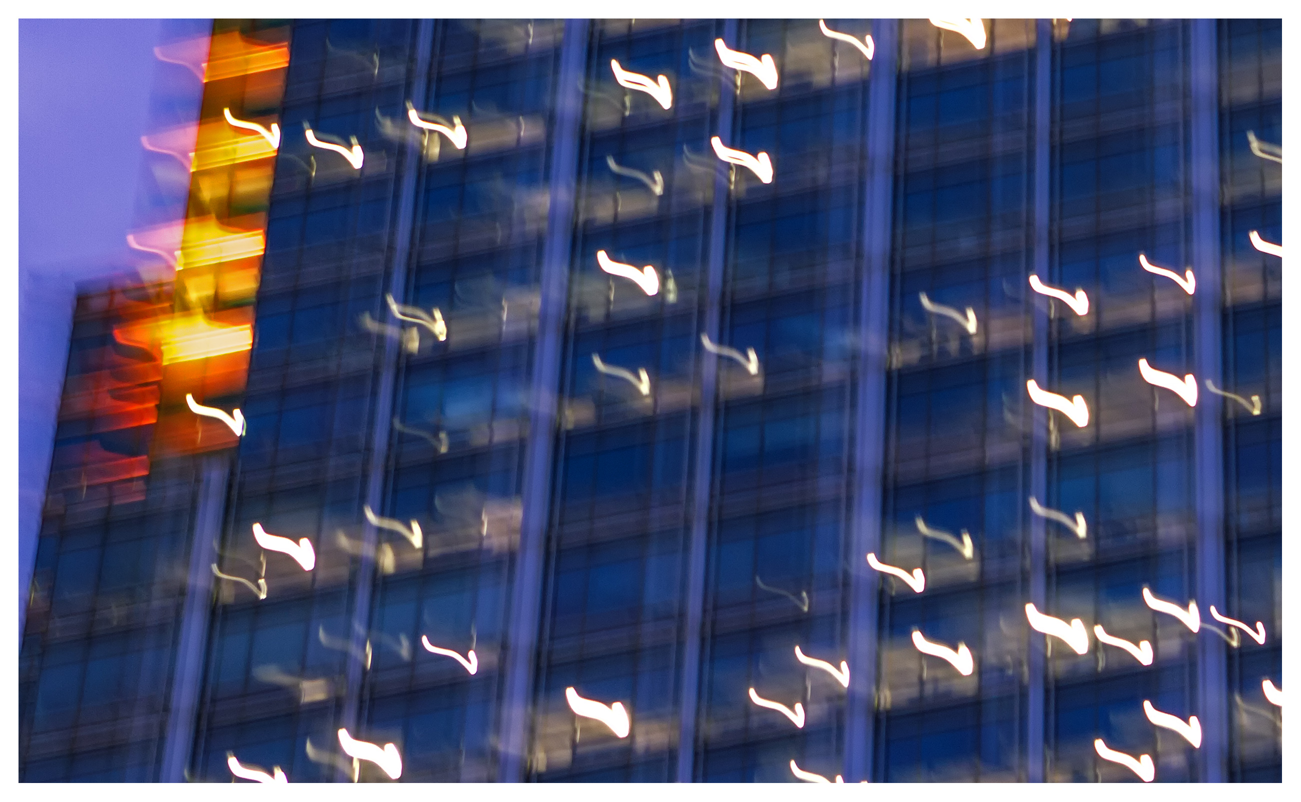 Architectural photography: Blurred image of Citibank building at Canary wharf, London, England